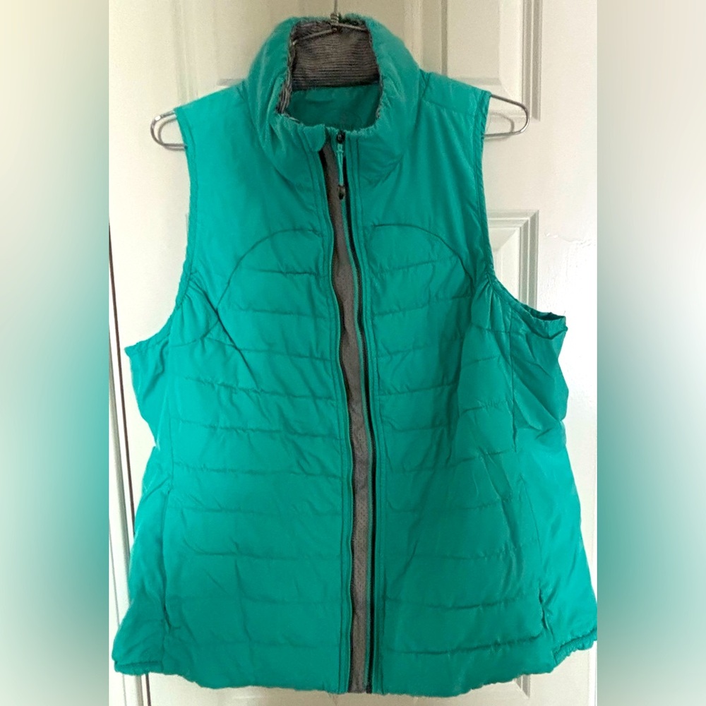 Tangerine Womens Athletic Puffer Vest Mock Collar Full Zip Pockets
Color Mint